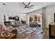 Spacious living room with modern furnishings and seamless indoor-outdoor flow to the patio at 6007 Hammock Hill Ave, Lithia, FL 33547