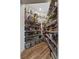 Well-organized walk-in pantry with wire shelving, providing ample storage space for food and household items at 6007 Hammock Hill Ave, Lithia, FL 33547