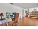 Spacious living room featuring natural light, wood floors and modern decor at 114 Windy Pl, Brandon, FL 33511