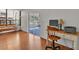 Comfortable living room features wood floors and glass sliding doors to the outside at 114 Windy Pl, Brandon, FL 33511