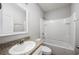 Bathroom featuring a shower-tub combination, single vanity and ample lighting at 3425 San Moise Pl, Plant City, FL 33567