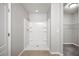 Bathroom area with shower and walk-in closet at 3425 San Moise Pl, Plant City, FL 33567