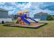 Community playground with slides, climbing structures, and soft landing surface for safe and fun outdoor play at 3425 San Moise Pl, Plant City, FL 33567