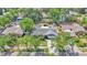 Aerial view of home with mature landscaping, nice curb appeal, and the surrounding neighborhood at 619 Shady Nook Dr, Brandon, FL 33511