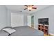 Bedroom with hardwood floors, ceiling fan, and closet at 619 Shady Nook Dr, Brandon, FL 33511