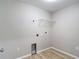Interior laundry room featuring washer/dryer hookups and utility connections at 12053 Centralia Rd, Weeki Wachee, FL 34614