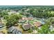 An aerial view showing neighborhood homes with large yards and mature trees in a well-established neighborhood at 625 Chilt Dr, Brandon, FL 33510