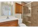 Bathroom with brown tile and shower at 625 Chilt Dr, Brandon, FL 33510