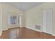 Dining room with a vaulted ceiling, wood floors and a decorative chandelier at 625 Chilt Dr, Brandon, FL 33510