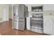 Kitchen featuring stainless steel appliances and hardwood floors at 625 Chilt Dr, Brandon, FL 33510