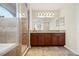 Bathroom with granite countertops, and double sinks, a glass shower, and tile flooring at 727 Vineyard Reserve Ct, Seffner, FL 33584