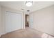 Bedroom with a closet and doorway that leads to another room at 727 Vineyard Reserve Ct, Seffner, FL 33584