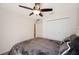 Bedroom with carpet, a ceiling fan, and double door closet at 727 Vineyard Reserve Ct, Seffner, FL 33584