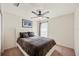 Neutral bedroom with carpet, a ceiling fan, and a large window at 727 Vineyard Reserve Ct, Seffner, FL 33584