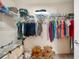 Walk-in closet with wire shelving, laundry baskets, and plenty of space at 727 Vineyard Reserve Ct, Seffner, FL 33584