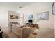 Spacious living room with comfortable seating and natural light at 727 Vineyard Reserve Ct, Seffner, FL 33584