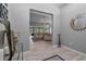 Spacious living room entryway featuring tile floors and an open floor plan at 7313 Crape Myrtle Way, Sarasota, FL 34241