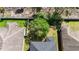 Aerial view of the backyard with lush trees providing plenty of shade and privacy at 1401 Parker Den Dr, Ruskin, FL 33570