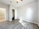 Bedroom featuring hardwood floors, closet, and ceiling fan at 1401 Parker Den Dr, Ruskin, FL 33570