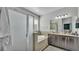 Bathroom featuring a soaking tub, and glass enclosed shower at 15706 Starling Water Dr, Lithia, FL 33547