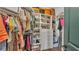 Walk-in closet filled with clothing and accessories at 15706 Starling Water Dr, Lithia, FL 33547