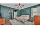Main bedroom features a walk in closet, en-suite bath, and luxury vinyl plank flooring at 15706 Starling Water Dr, Lithia, FL 33547