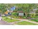 Community entrance sign reading 'Starling' and features landscaping and a streetlight at 15706 Starling Water Dr, Lithia, FL 33547