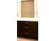 Bathroom vanity with dark wood cabinets, white quartz countertop and three drawers at 2512 58Th E Cir, Palmetto, FL 34221