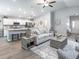 Open-concept living space with neutral tones, a spacious layout, and ample natural light at 2556 58Th E Cir, Palmetto, FL 34221