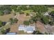 The aerial view shows property and outbuildings at 4020 Mcintosh Rd, Dover, FL 33527