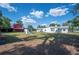 Expansive backyard with additional outbuildings, offering plenty of storage at 4020 Mcintosh Rd, Dover, FL 33527