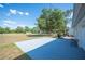 Spacious backyard with a concrete patio, perfect for outdoor entertaining at 4020 Mcintosh Rd, Dover, FL 33527
