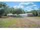 Spacious lot featuring multiple houses, offering diverse living options and ample space at 4020 Mcintosh Rd, Dover, FL 33527