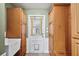 The mud room features built-in cabinets, a sink, and access to the backyard through a dog-friendly door at 4020 Mcintosh Rd, Dover, FL 33527