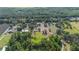 Aerial view highlighting the property lines amidst a lush, green landscape at 4020 Mcintosh Rd, Dover, FL 33527