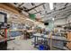 Spacious workshop area with multiple workbenches and tools at 4020 Mcintosh Rd, Dover, FL 33527