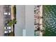 Aerial top-down view of a waterfront condo with parking, balconies, and direct waterfront access at 4778 Coquina Key Se Dr # 4778, St Petersburg, FL 33705