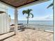 Spacious back porch provides stunning water views and a seamless transition to outdoor relaxation by the beach at 4778 Coquina Key Se Dr # 4778, St Petersburg, FL 33705
