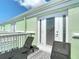 Charming balcony with outdoor seating and scenic views, perfect for relaxation and enjoying the fresh air at 4778 Coquina Key Se Dr # 4778, St Petersburg, FL 33705