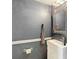 Small bathroom with vanity and framed mirror at 4778 Coquina Key Se Dr # 4778, St Petersburg, FL 33705