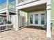 Charming patio offers seamless indoor-outdoor living with views of the ocean and convenient access to home at 4778 Coquina Key Se Dr # 4778, St Petersburg, FL 33705