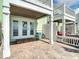 Charming patio offers seamless indoor-outdoor living with views of the ocean and convenient access to home at 4778 Coquina Key Se Dr # 4778, St Petersburg, FL 33705