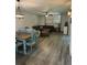 A spacious open living area featuring modern furnishings and stylish decor at 135 Wild Palm Dr, Bradenton, FL 34210