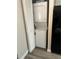 A stacked washer and dryer is located in a closet at 135 Wild Palm Dr, Bradenton, FL 34210