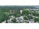 Aerial view of the property's location, surrounded by lush greenery and neighborhood amenities at 3205 N 66Th St, Tampa, FL 33619