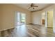 Bright bedroom with patio access and ensuite bathroom at 3419 Trapnell Ridge Dr, Plant City, FL 33567