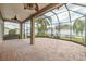 Wide screened-in patio with brick floors, perfect for outdoor entertaining at 3419 Trapnell Ridge Dr, Plant City, FL 33567