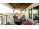 Spacious balcony features comfortable seating, dark ceiling, and beautiful water view at 531 68Th St, Holmes Beach, FL 34217
