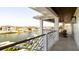 Beautiful covered balcony with water view, detailed railing, and overhead lighting at 531 68Th St, Holmes Beach, FL 34217