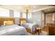 Comfortable guest bedroom featuring two twin beds and natural light at 531 68Th St, Holmes Beach, FL 34217
